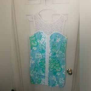 Lilly Pulitzer size 10 dress with white lace down the front, green/blue flowers